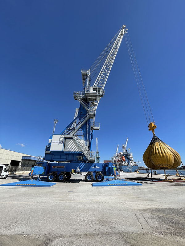 IMHC 1580 mobile harbour crane in use in a port