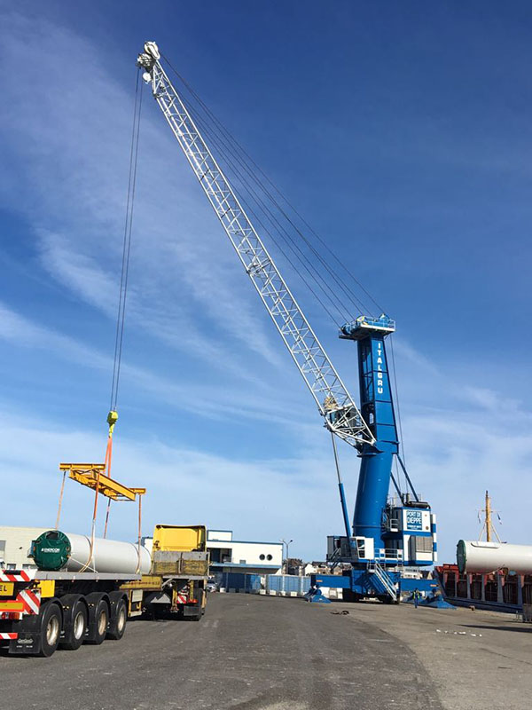 ITALGRU blue and yellow mobile harbour crane in a port