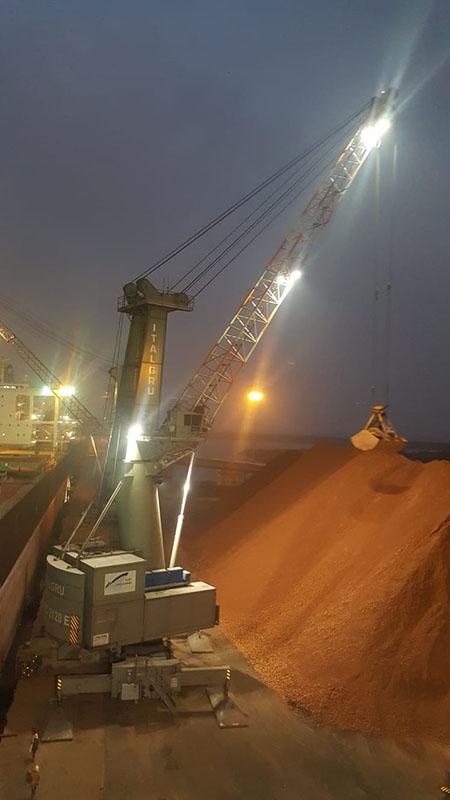 ITALGRU mobile harbour crane in a port by night